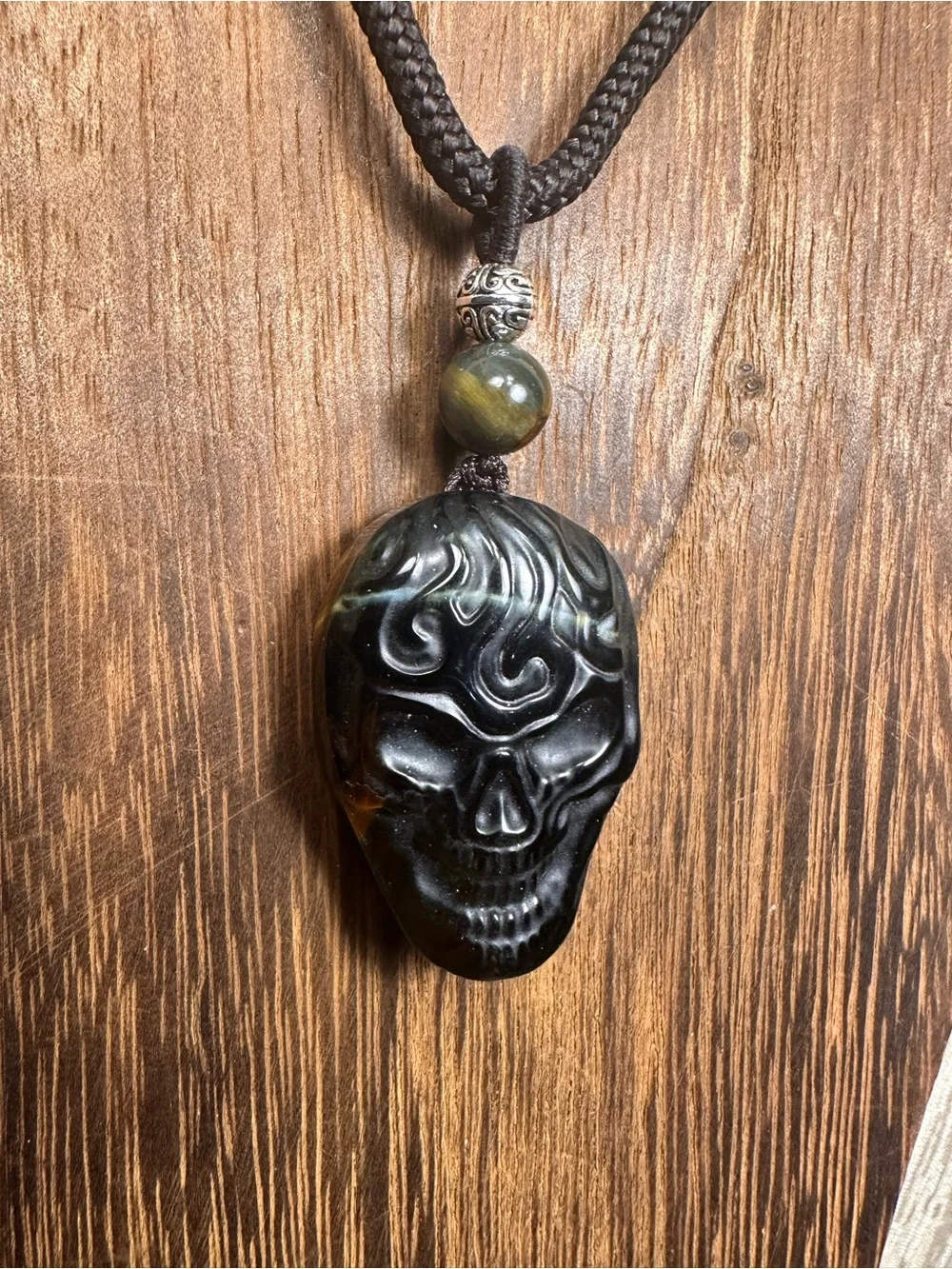 Unique Blue and Golden Tiger’s Eye Skull Carving Pendant Necklace on Brown